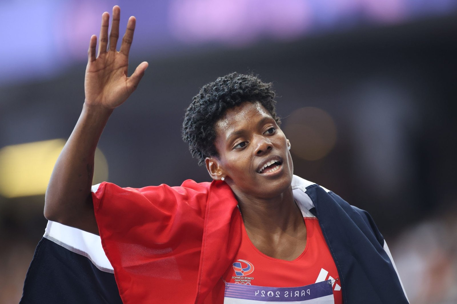 licensed-image PARIS, FRANCE: AUGUST 09: Marileidy Paulino of Dominican Republic reacts to her gold medal win in the Women's 400m Final during the Athletics Competition at the Stade de France during the Paris 2024 Summer Olympic Games on August 9th, 2024, in Paris, France. (Photo by Tim Clayton/Corbis via Getty Images)